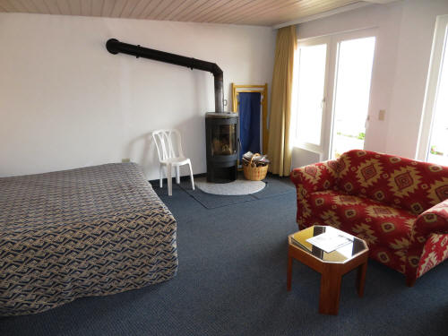 HUARAZ TREKKING: The deluxe rooms with a woodstove.