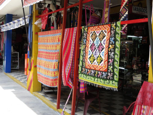WHAT ARE THE BEST INDIAN MARKETS IN PERU FOR ARTS AND CRAFTS [2021]?: Multicolored rugs and table cloths.