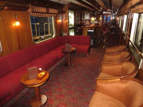 MACHU PICCHU TRAIN FROM CUSCO: VISTADOME Y LUXURY TICKETS : The Hiram Bingham train has polished wood and brass with sofas and deluxe seats.